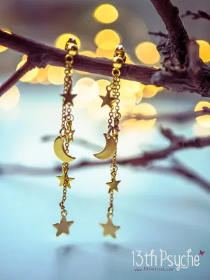 Gold moon and stars dangle earrings